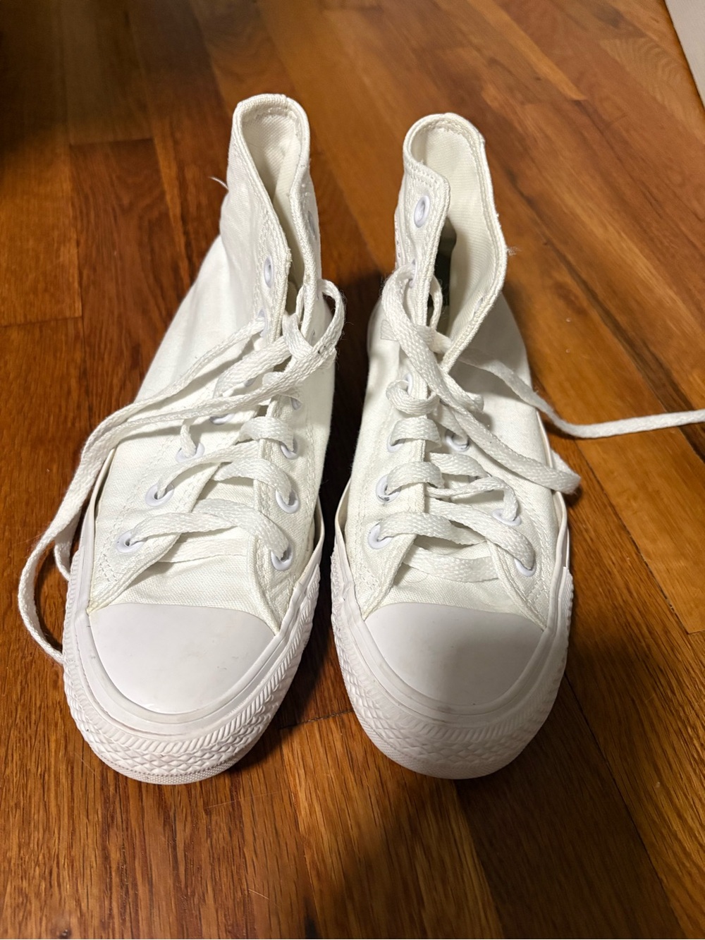 White Converse high tops